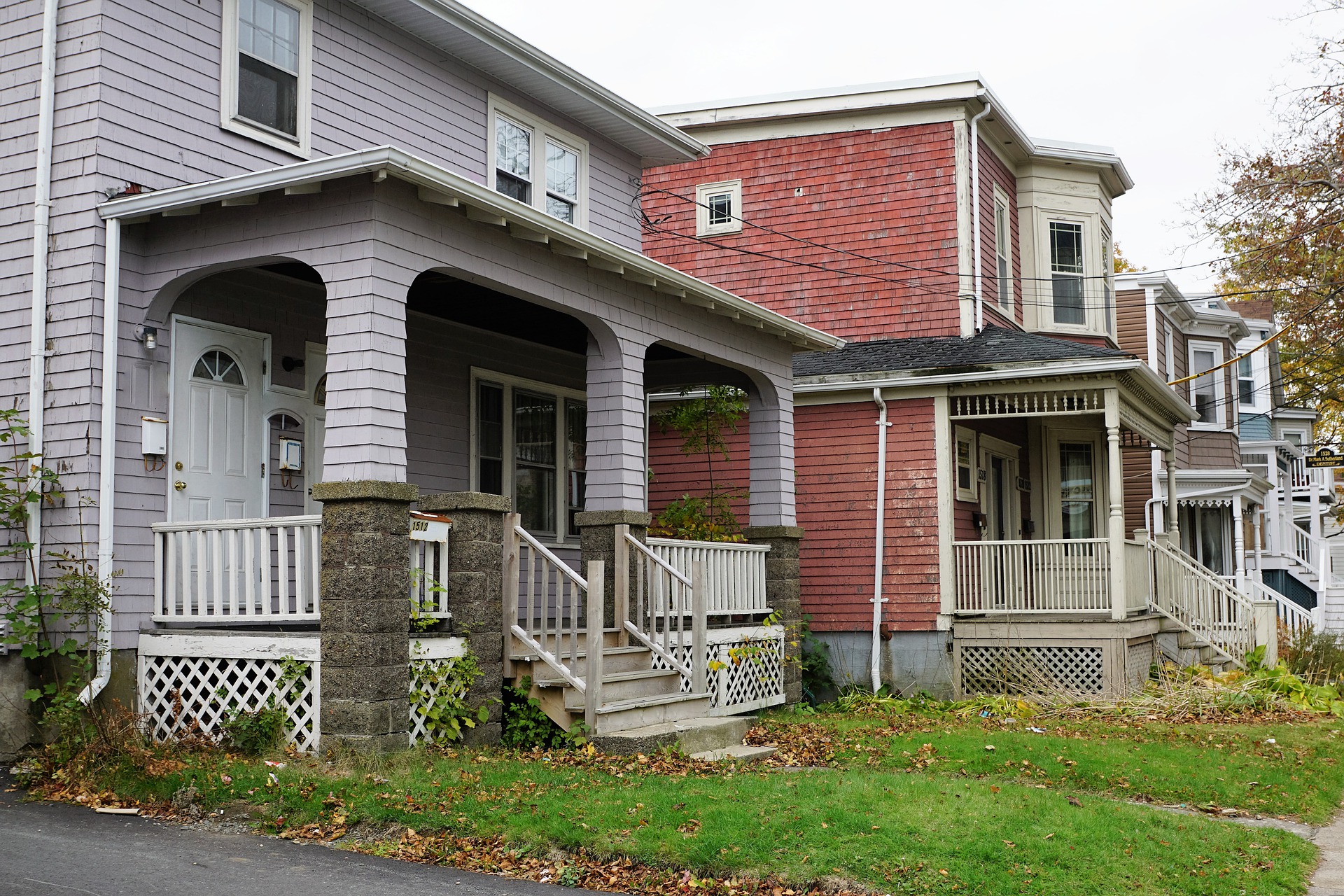 Street view of older duplex housing